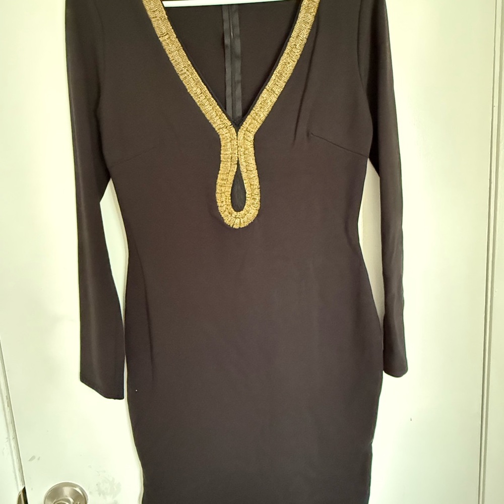 Elegant Black Dress with Gold Trim